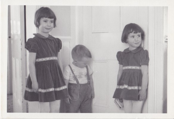 This is me (at left) and my younger siblings John and Melanie at the Manse in 1966 – the era when we were at the prime age for enjoying an early-Easter-morning Easter-egg hunt. My youngest sibling, Ken, wasn't yet born; when he came along, he just added to the Easter-morning ruckus. (Photo by my grandfather, J.A.S. Keay)